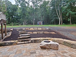 Boulder walls and steps with sitting bench