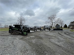 Our fleet of plow trucks and track loaders