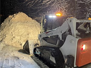 Track loader used to snow